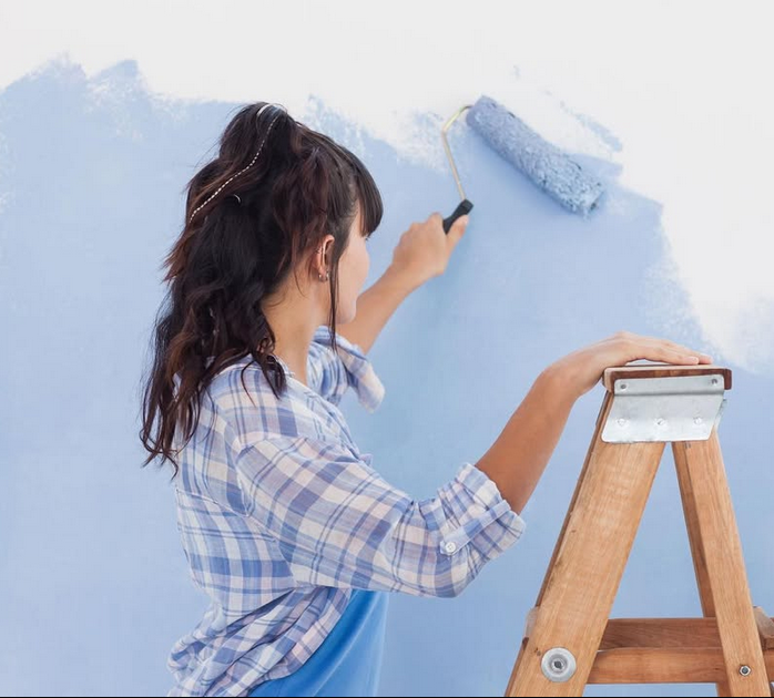 Phoenix painting painter painting a wall blue